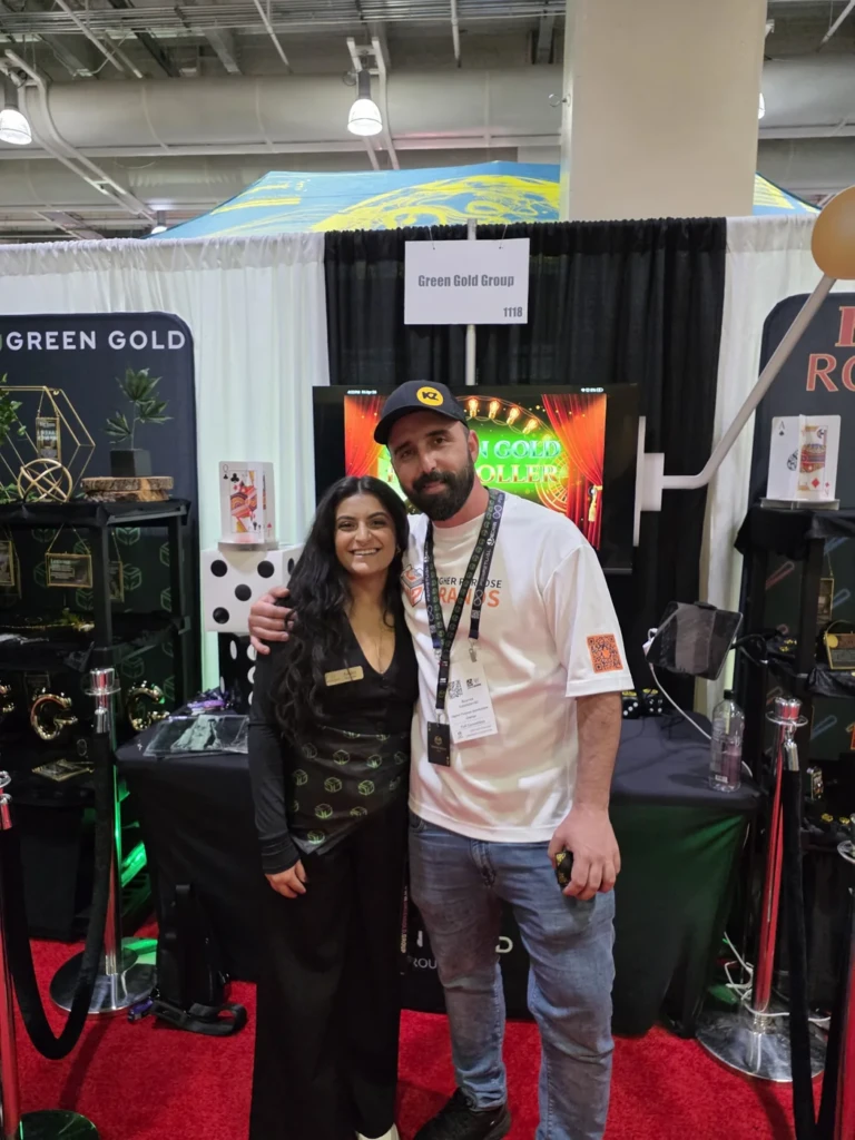 Two of the HP Brands team at a trade-show booth